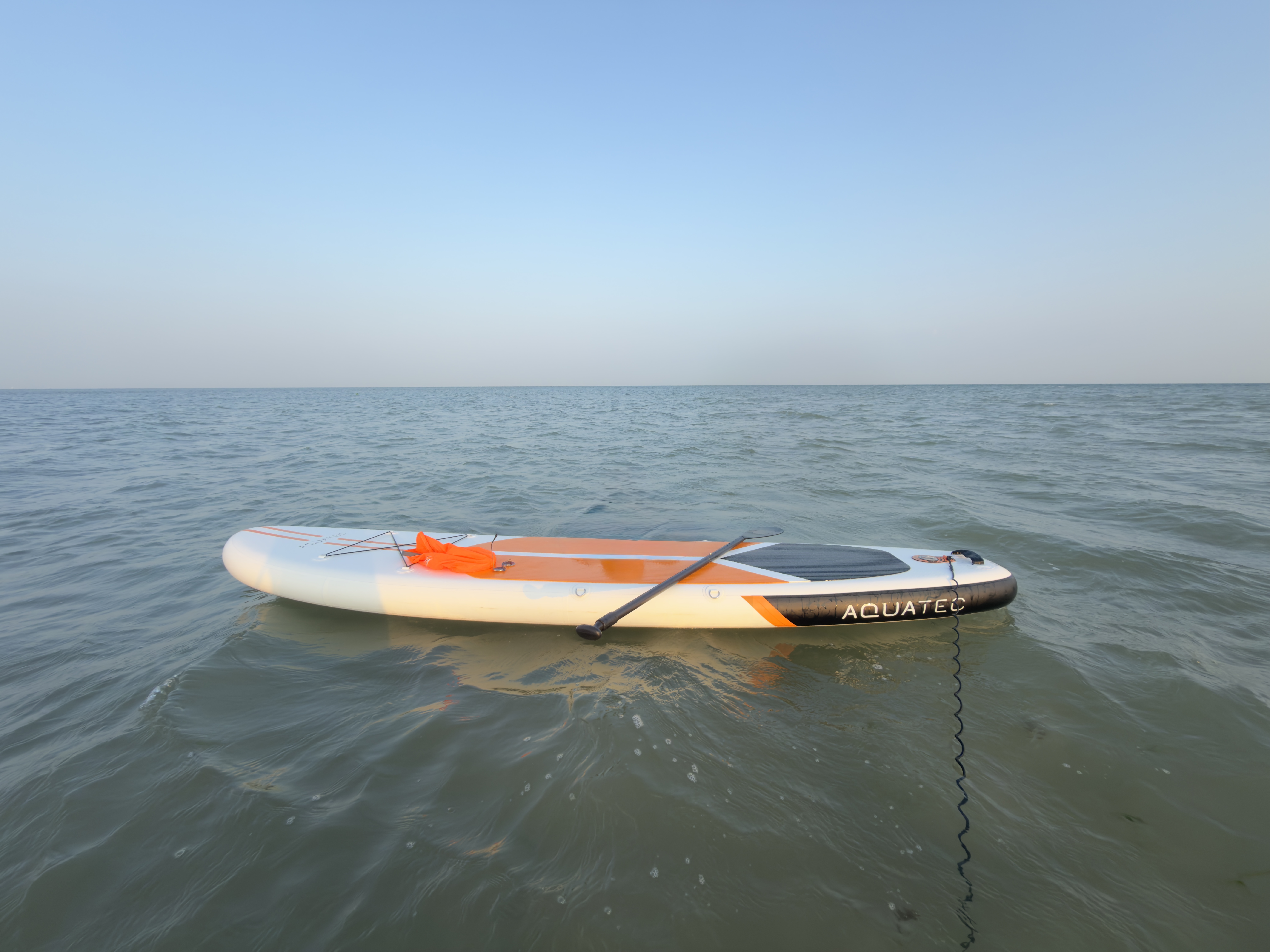 AQUATAEC Inflatable Stand Up Paddle Board Floating in the Sea